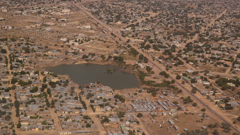  Aerial view to NDjamena and Chari or Chari river, Chad Von homocosmicos - stock.adobe.com