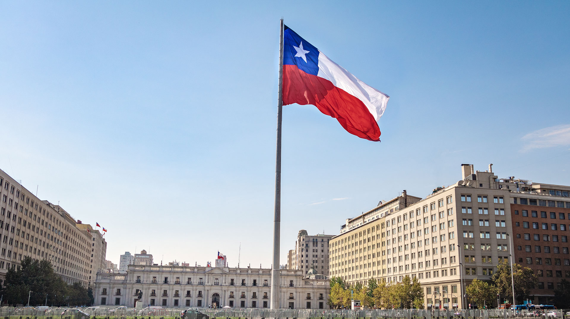 La Moneda Palace and Bicentenario Chilean Flag - Santiago, Chile 