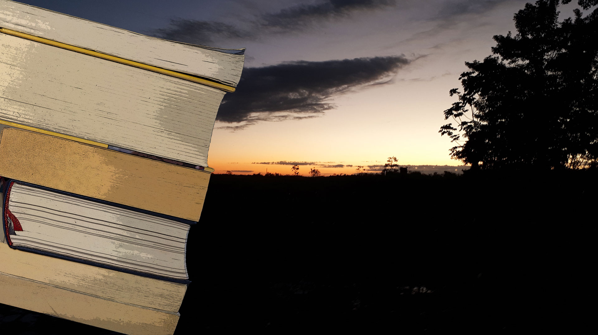 Im Vordergrund ein Bücherstapel, im Hintergrund tropischer Sonnenuntergang bei Riosucio/Chocó (Kolumbien)