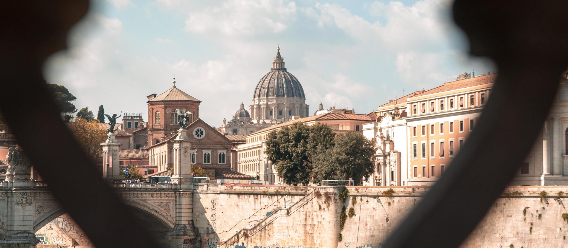 St Peter's Basilica from a bridge over the Tiber