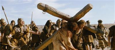 Scene: Joseph of Arimathea helps Jesus carry the cross