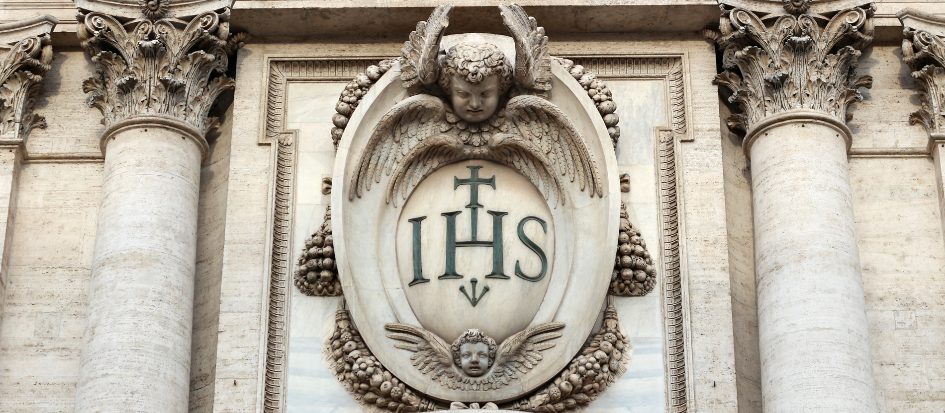 The emblem of the Jesuits above the main church of the order Il Gesú in Rome.