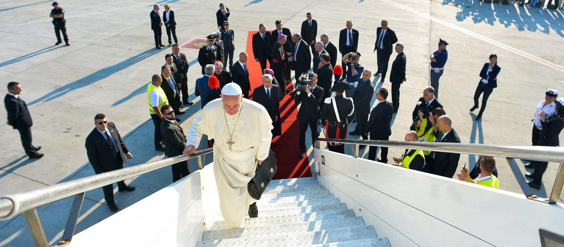 Pope Francis boards a plane to travel to Sarajevo on 6 June 2015