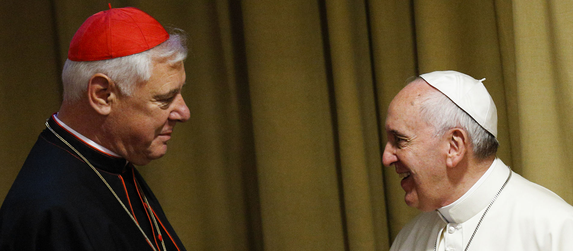 Cardinal Gerhard Ludwig Müller speaks with Pope Francis