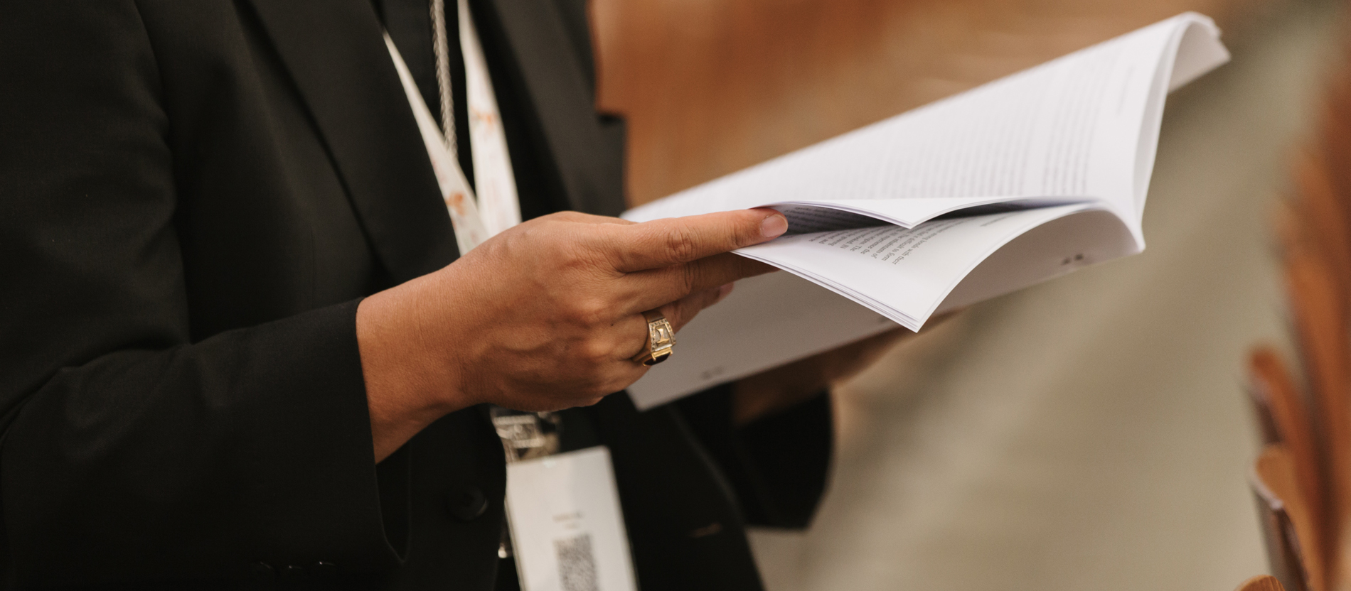 A bishop reads the final document of the World Synod in the Synod Hall